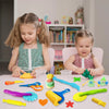 A collection of colorful dough tools for kids including an animal cutter, rolling pin, and extruder.