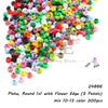 A pile of round building blocks in various colors, including pink, green, yellow, and white.
