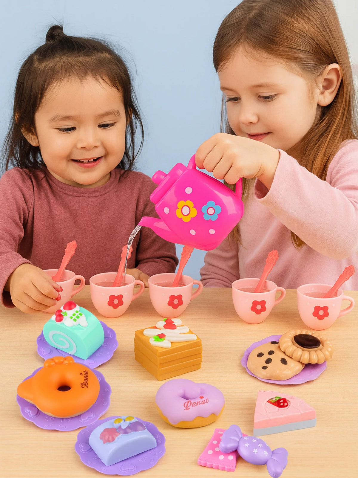 A colorful 27-piece pretend play tea party set for kids featuring pink and purple plastic cups, teapot, and food items.