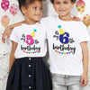 Two children wearing white t-shirts celebrating their 5th and 6th birthdays with colorful bunting