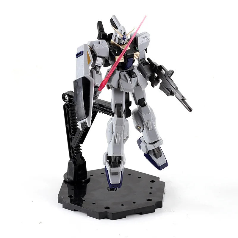A gray and blue mecha action figure standing on a black adjustable snake bone stand.