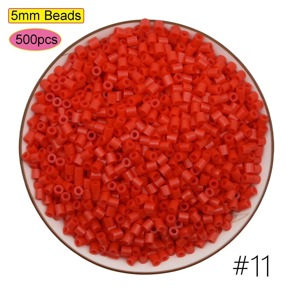 A pile of 5mm orange beads, packaged in a round dish, for creative fuse bead craft kits.