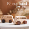 A wooden Montessori push cart toy car made of beech wood is shown on a white surface.