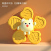 A cute yellow cat-shaped suction cup spinner bath toy for toddlers.