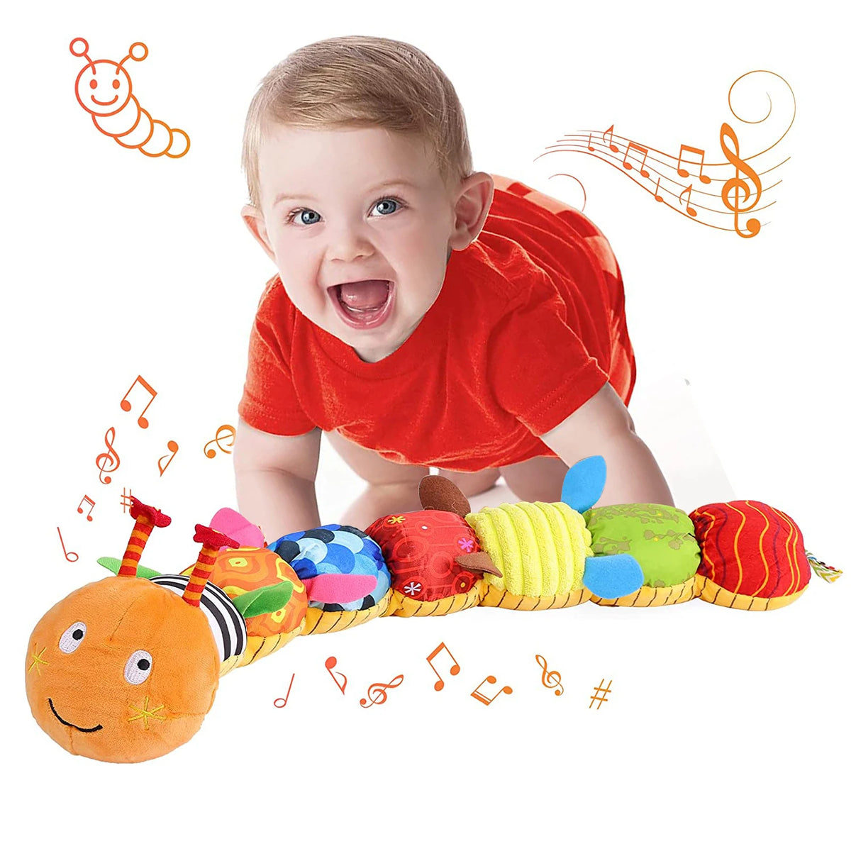A baby is holding a soft musical rattle caterpillar plush toy with colorful, textured segments.