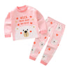Pink kids pajama set for a baby featuring a polar bear design with hearts
