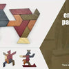 A wooden tangram puzzle made of eleven interlocking hexagonal blocks forming an abstract animal shape.
