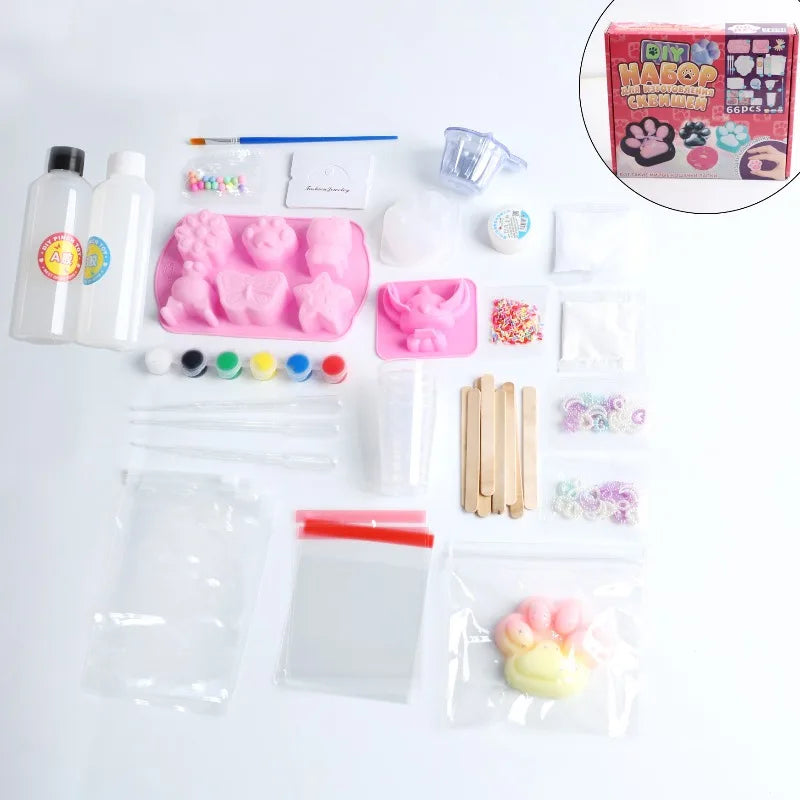 A DIY squishy making kit showing various pink and white silicone molds, liquid gel, and tools for crafting squishy toys.