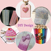 A collection of DIY craft items including a heart-shaped charm, a rhinestone baseball cap, and colorful layered cups.
