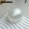 A smooth, spherical white silicone fidget ball for stress relief and focus.