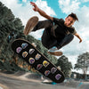 A young man performing a trick on a skateboard against a cloudy sky.
