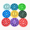 A collection of ten colorful math fidget spinners showing various numbers and operations on the surface