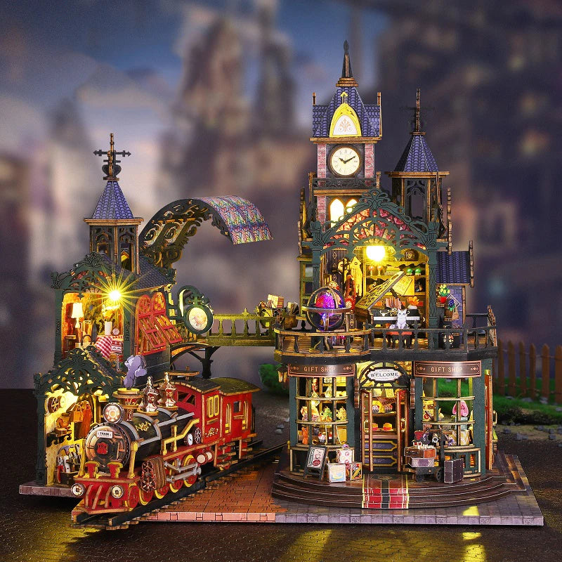 A detailed wooden miniature rail-track city dollhouse kit featuring a large clock tower and train display.