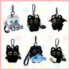A collection of cute plush black cat keychains and bag charms in various styles and colors.
