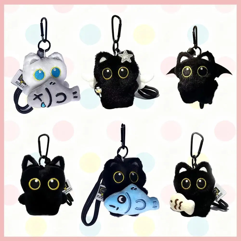 A collection of cute plush black cat keychains and bag charms in various styles and colors.