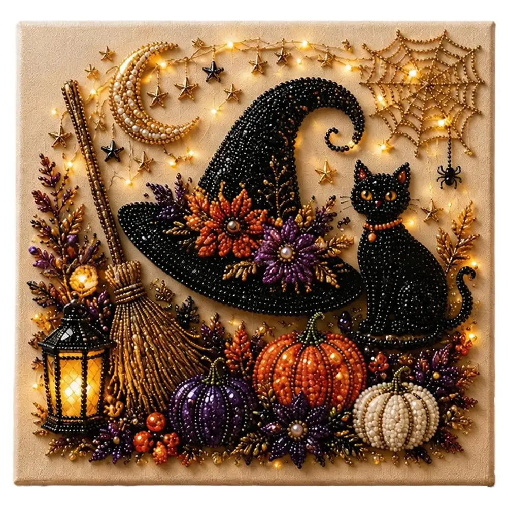 A detailed mosaic art kit featuring a black witch, cat, crescent moon, and autumn pumpkins made of gold and pearl beads.
