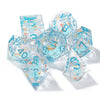 A set of seven pink floral butterfly resin polyhedral dice for tabletop role-playing games