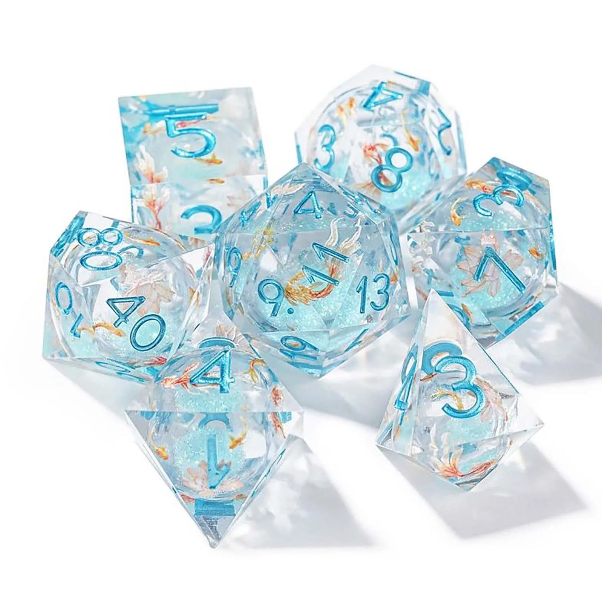 A set of seven pink floral butterfly resin polyhedral dice for tabletop role-playing games