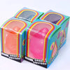 A box of a pink glitter squishy toy for stress relief and focus, shown from the side.