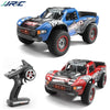 A blue and black RC monster truck with LED lights and a separate remote control is shown.