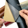 Close-up of a black PU leather material with a gray self-adhesive repair patch being applied to it.