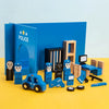 A set of wooden police figures, a blue police box, and an orange wooden building tool set for pretend play.