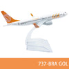 Diecast model of a Gol aircraft in white and orange livery