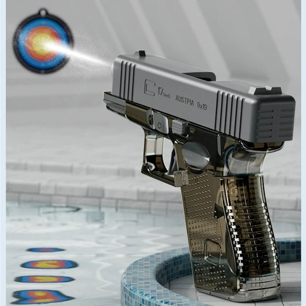A silver water blaster gun is shown firing a stream of water toward a target, with blue tiles in the background.