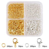 A clear plastic container holds various gold and silver lobster clasps and open jump rings for jewelry making.