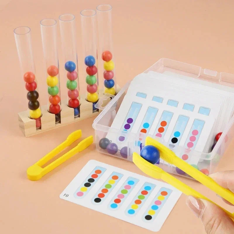 A set of wooden clip beads in various colors stacked in clear test tubes with yellow tweezers and a plastic storage box.