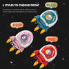 Three styles of a rocket spacecraft piggy bank with key lock in blue, pink, and red colors against a dark space background.