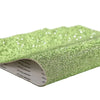 Green sparkling rhinestone adhesive tape rolled up for DIY crafts and decor