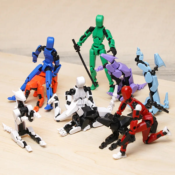 A collection of multi-jointed shapeshifting puppets in various colors and forms arranged on a wooden surface.