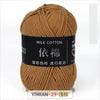 A ball of brown milk cotton yarn labeled YIMIAN 23 with Chinese characters for knitting and crochet.
