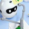 A white dinosaur robot with flexible arms is shown drawing a green tree on a piece of paper.