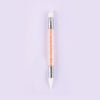 A dual-ended silicone head nail art dotting pen with a crystal handle and orange glitter tip.