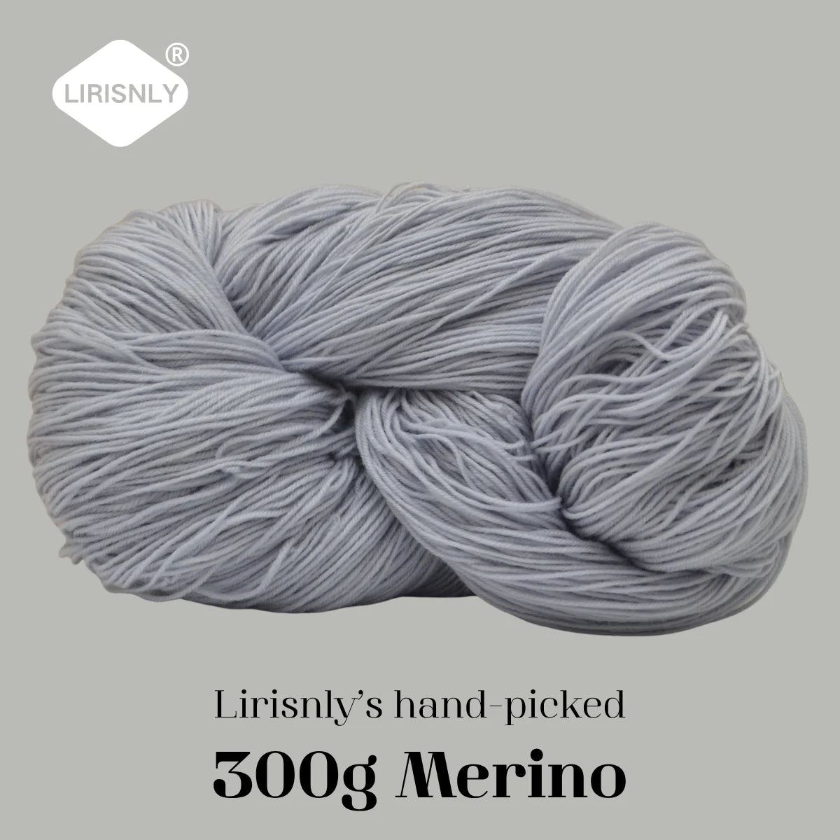 A ball of light gray Merino wool yarn for knitting, crocheting, and spinning.