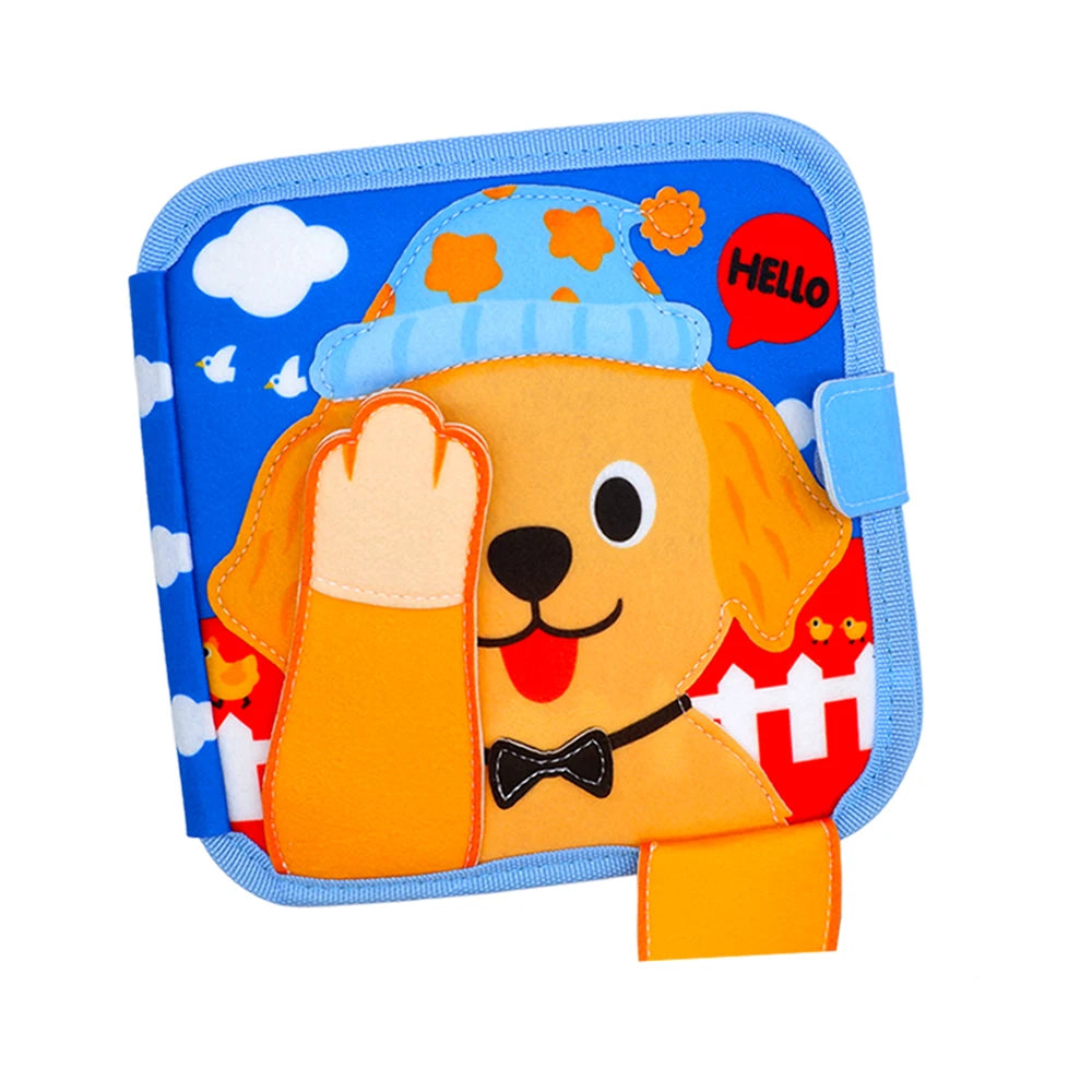 A felt busy board featuring a yellow dog wearing a blue hat and a red polka-dot scarf on a blue background.