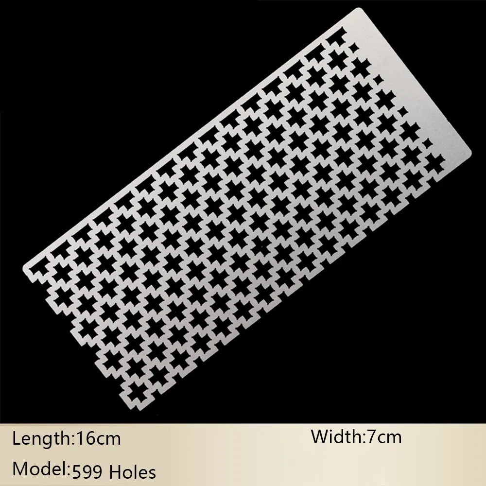 A rectangular stainless steel ruler with a pattern of cross shapes for diamond painting, shown diagonally against a black bac