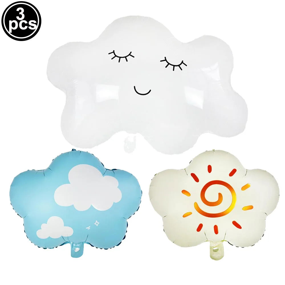 Three clear foil balloons shaped like clouds and a sun with a spiral design for birthday party decor