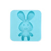 A light blue silicone mold shaped like a bunny for a DIY craft kit.