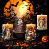 A candle display featuring silicone molds of witch portraits and skulls set against a dark background with bats flying near a