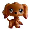 A small, tan Bobbing Deer bobblehead toy with large black eyes and a brown body.