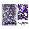 Bag of purple and silver flat-back resin rhinestones for DIY craft and nail art