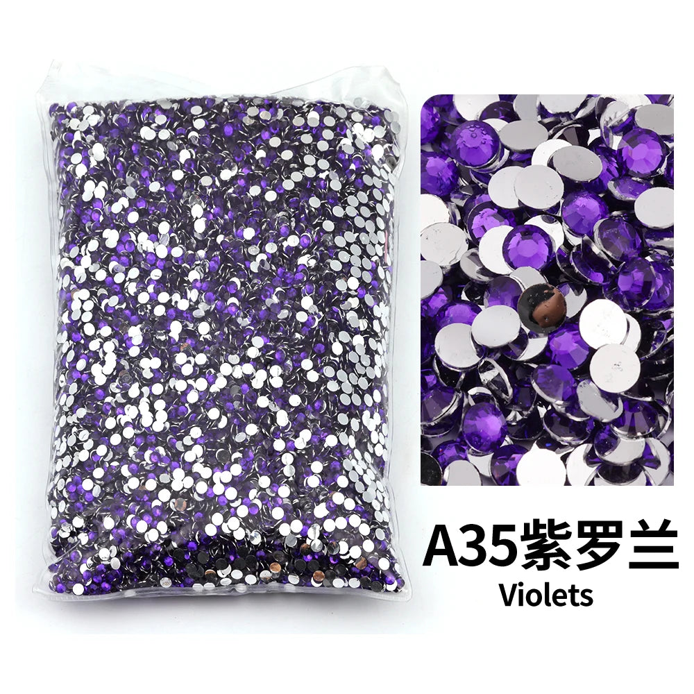 Bag of purple and silver flat-back resin rhinestones for DIY craft and nail art