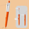 An orange and white squirt water spray pen is shown with a retractable nib, demonstrating how to add water.