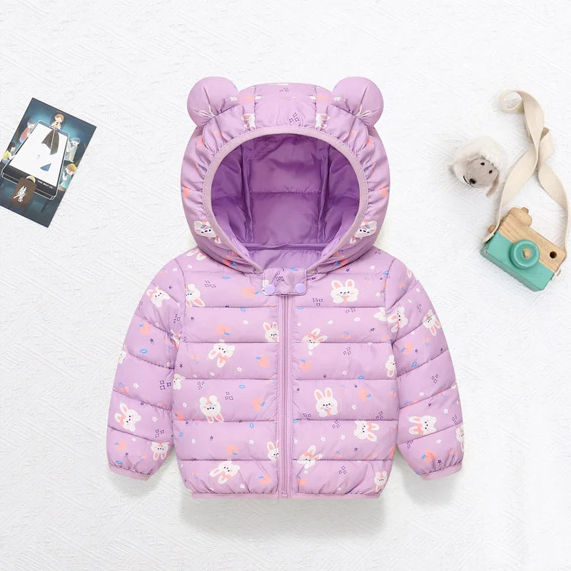 A purple cartoon-themed hooded puffer jacket for a child, displayed on a white background.