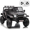 A black electric ride-on truck for kids with LED lights and a white parent remote.