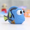 A blue rubber fish toy with a yellow mouth and the number 3181 is shown on a white surface.