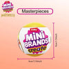 A yellow Zuru Mini Brands Create Masterpieces blind ball is shown against a light pink background.